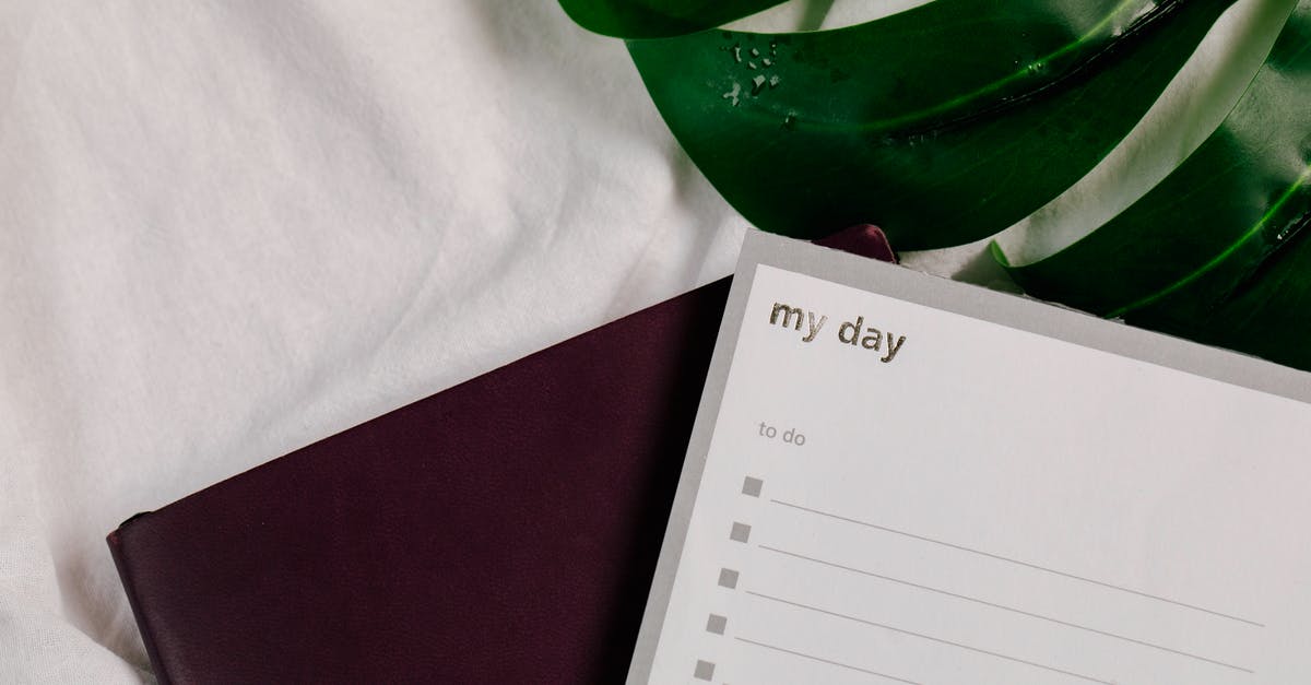 Visa might be late - What do I do? - White Printer Paper on Red Textile