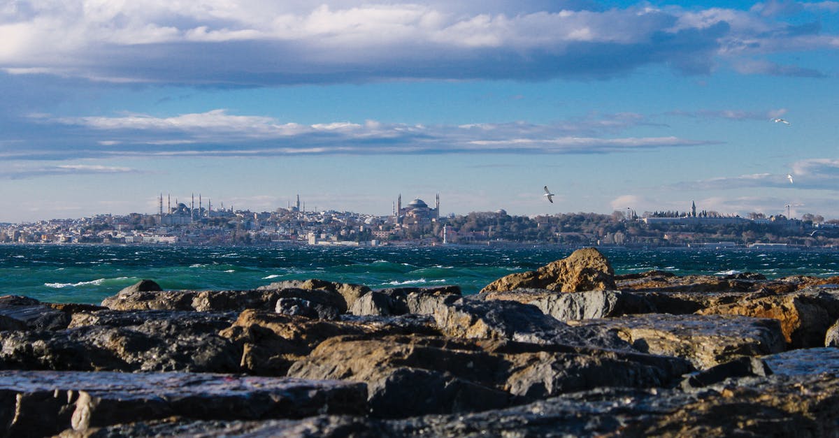 Visa requirement during a layover at a German airport for Colombian citizens flying to Turkey - Brown Rocky Shore Under Blue Sky Visa requirement during a layover at a German airport for Colombian citizens flying to Turkey - Brown Rocky Shore Under Blue Sky