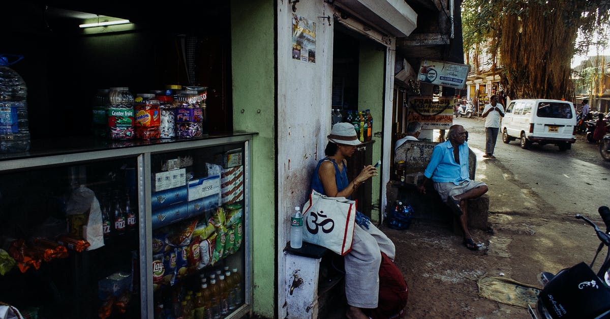 Visa Requirement for Ecuador - Indian Citizen - Asian people on street in poor city district Visa Requirement for Ecuador - Indian Citizen - Asian people on street in poor city district