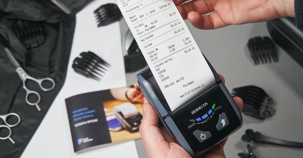Visa requirements for check out and in - Unrecognizable person taking check from cash register Visa requirements for check out and in - Unrecognizable person taking check from cash register