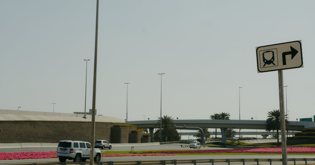 Visa requirements for Dubai airport - Cars Parked on Parking Lot