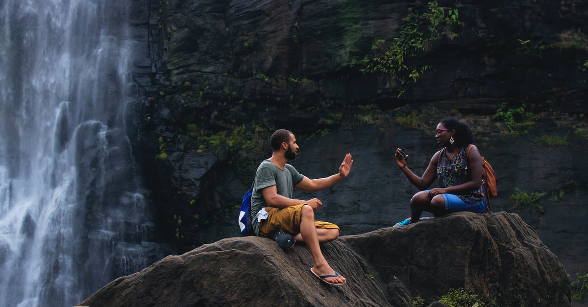 Visa type,embassy for two EU visits (interview and tourism)? - Man and Woman Talking Near Waterfalls