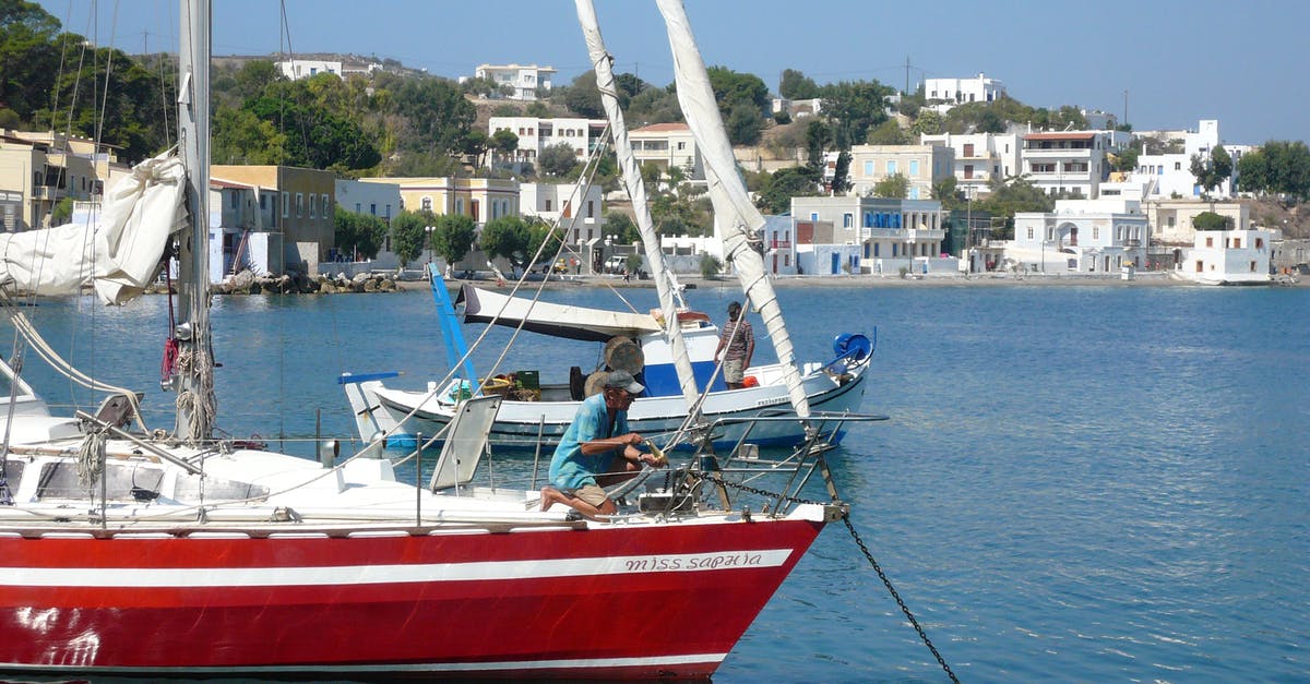 Visa validity port of exit or port of entry - Men on Boats in City Harbor Visa validity port of exit or port of entry - Men on Boats in City Harbor