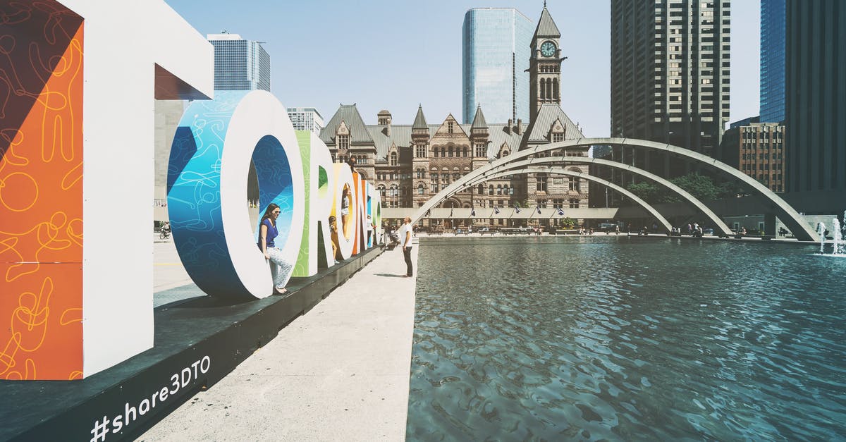 Visiting Canada for a job interview: tourism or business? eTA or visa? - Freestanding Letters Near Fountain