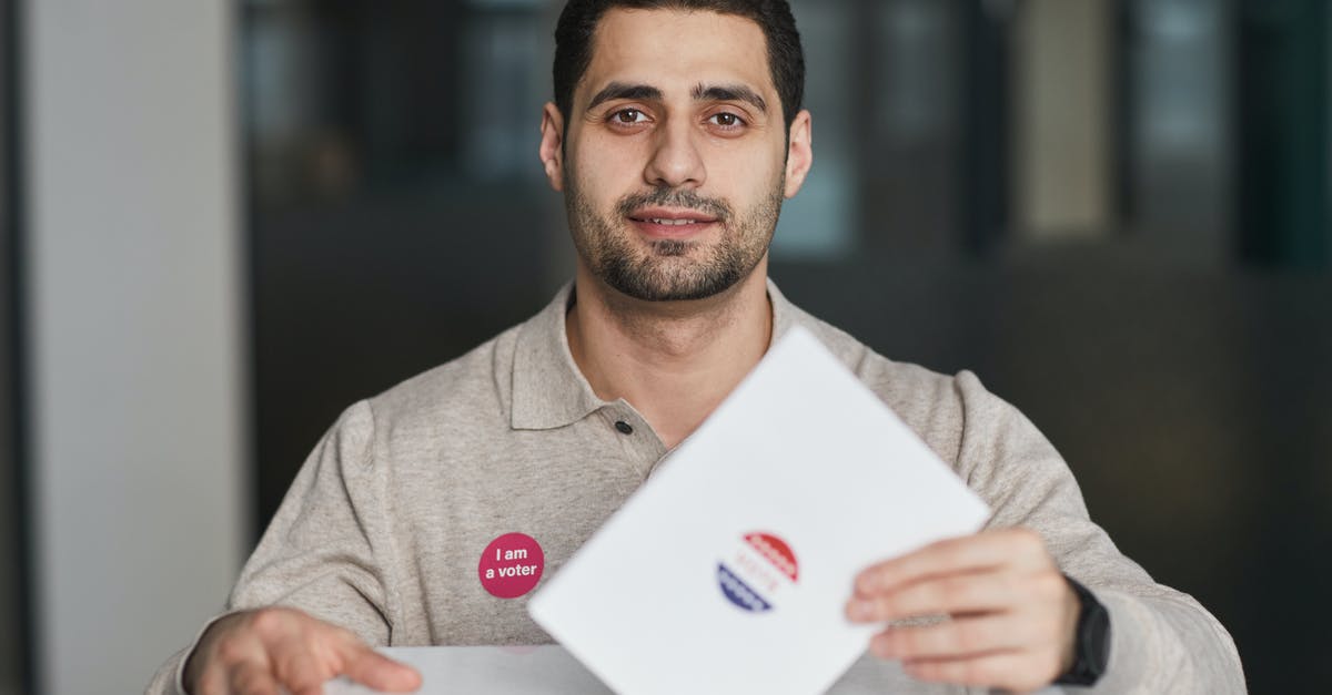 Visiting EU as British citizen long-term - Man Standing by the Ballot Box Visiting EU as British citizen long-term - Man Standing by the Ballot Box