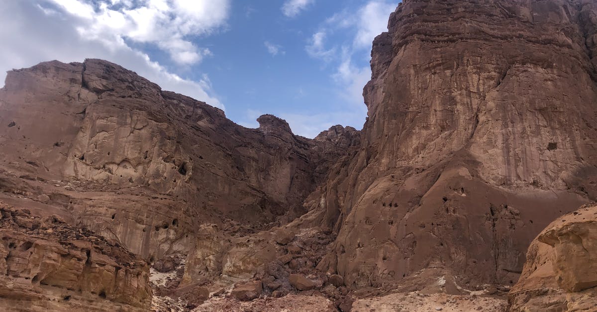 Visiting Israel with Tunisian stamp and Russian visas - Brown Rocky Mountain Under Blue Sky Visiting Israel with Tunisian stamp and Russian visas - Brown Rocky Mountain Under Blue Sky