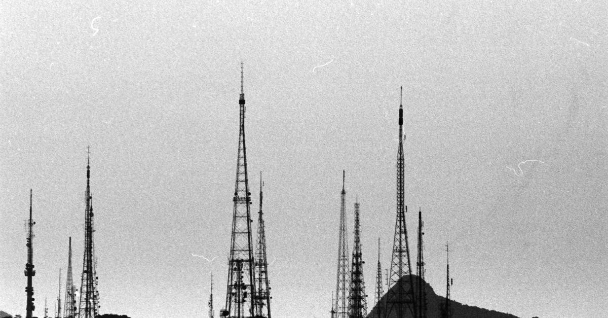Visiting Rio de Janeiro, Brazil as a volunteer for the 2016 Olympics what funds do I need for a visa, and in what form? - Grayscale Photo of Radio Towers and Antennas on Morro do Sumare