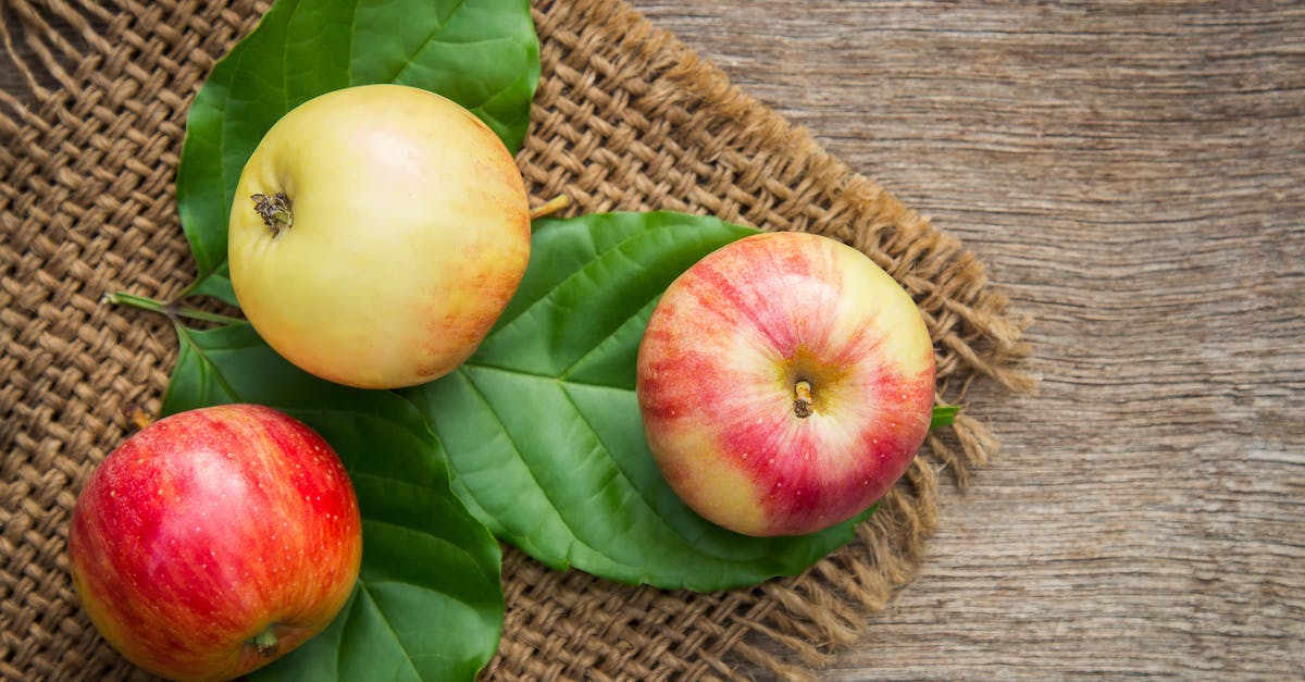 Visiting the U.K. for three months will I have issues at IO? [closed] - Close-up Photo of Red-and-yellow Apple Fruits on Green Leaves