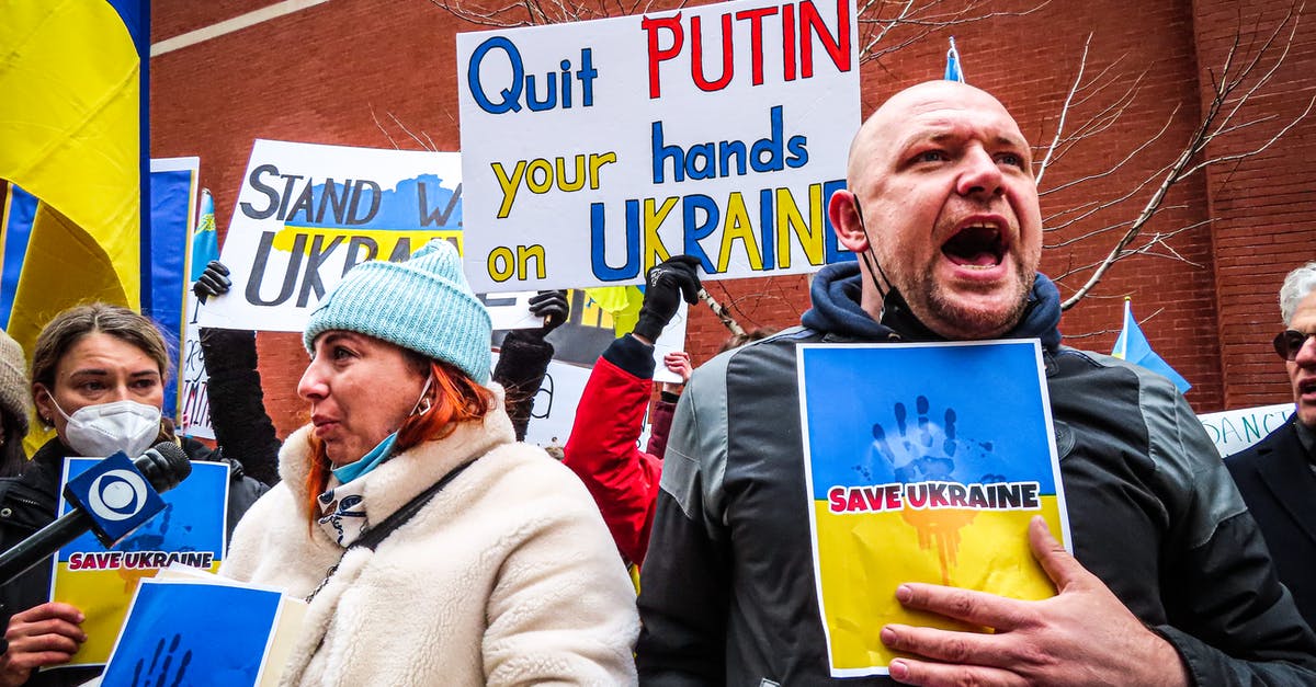 Visiting Ukraine and Russia - People Holding Anti-War Signs and Protesting in the Street Visiting Ukraine and Russia - People Holding Anti-War Signs and Protesting in the Street