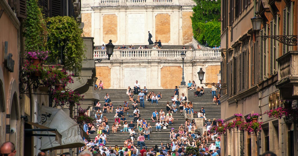 Visitor Schengen Visa Denied 2 times. Can I apply for 15 days tourist visa and stay for 60 days? [duplicate] - Group of tourists strolling on narrow street and resting on stairs near aged buildings in summer day in city center