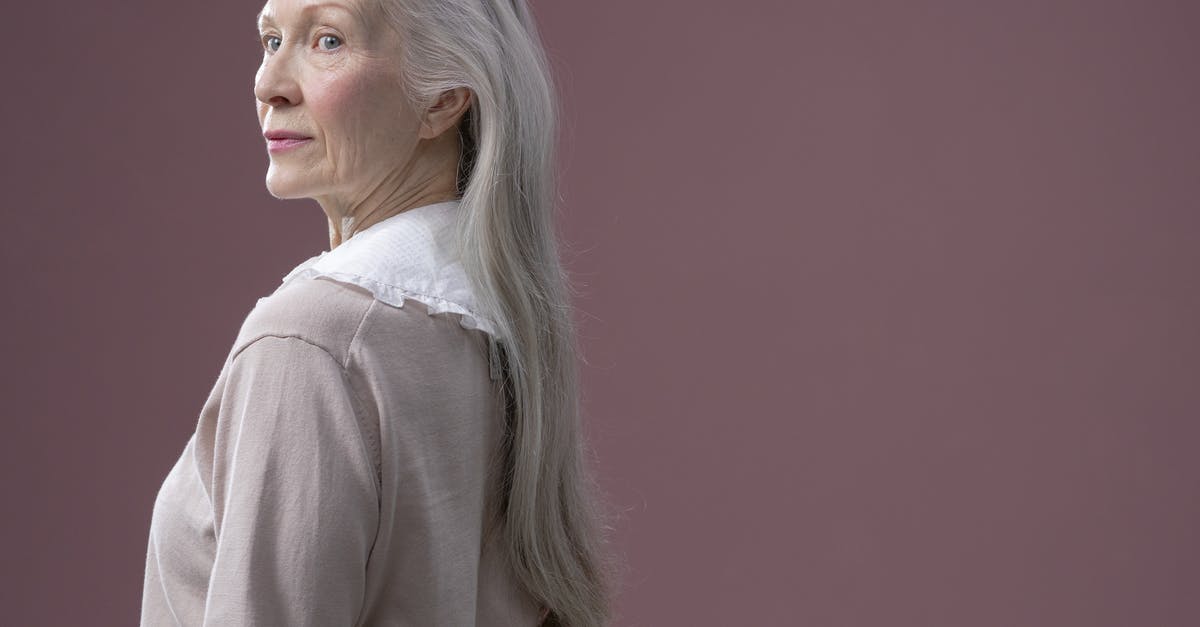 Visitor visa for Grandmother - Woman in White Long Sleeve Shirt Visitor visa for Grandmother - Woman in White Long Sleeve Shirt