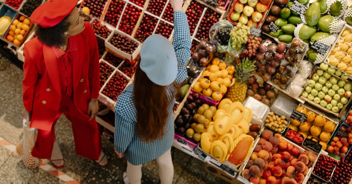 Vueling bags rules when buying extra weight - Women Buying Fruits in Grocery Market Vueling bags rules when buying extra weight - Women Buying Fruits in Grocery Market