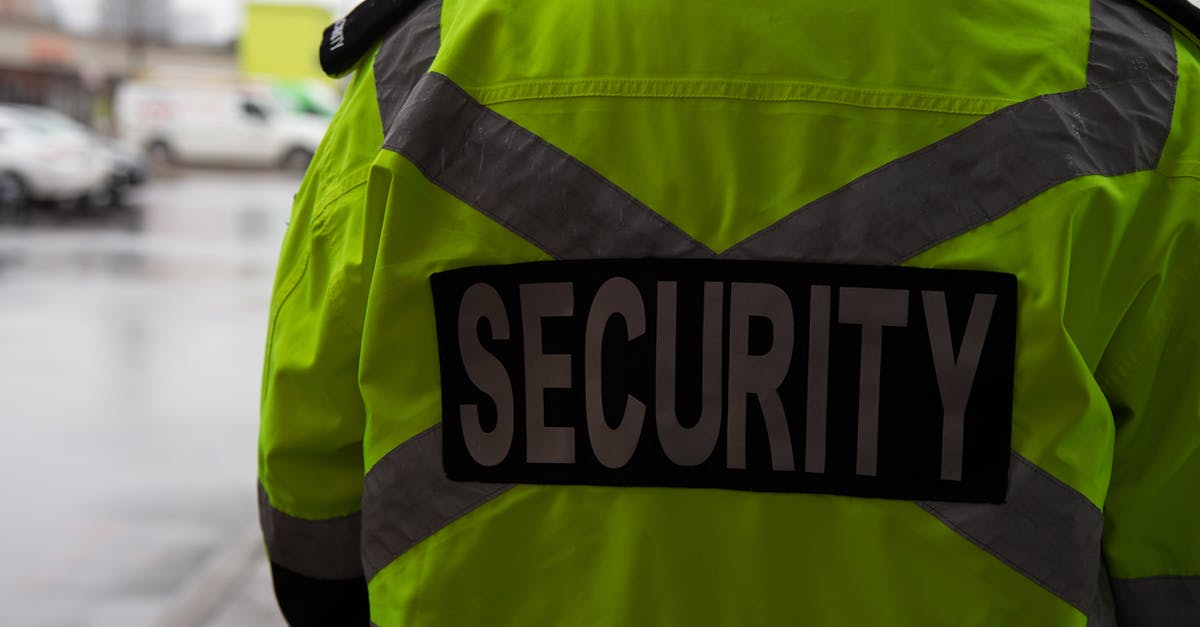 Warning about needing "authorization" when booking ticket - A security guard watching over the parking area. A security guard is protecting property from illegal parking and theft. https://fpsecurity.ca/ Warning about needing "authorization" when booking ticket - A security guard watching over the parking area. A security guard is protecting property from illegal parking and theft. https://fpsecurity.ca/