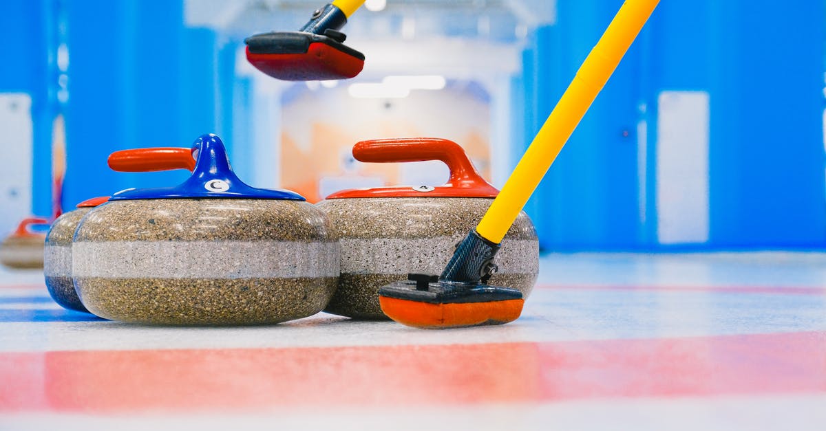 Watering Flowers and Handling Post during long periods of absence: any multinational firm to handle this in any country? - Granite curling stones with handles and long brooms placed on circular target area on ice sheet in arena with blue columns Watering Flowers and Handling Post during long periods of absence: any multinational firm to handle this in any country? - Granite curling stones with handles and long brooms placed on circular target area on ice sheet in arena with blue columns