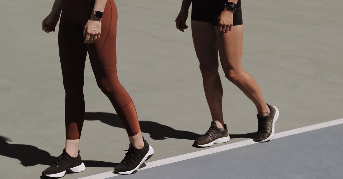 Wearing shorts with hairy legs in Moscow - Women Walking on Athletic Field