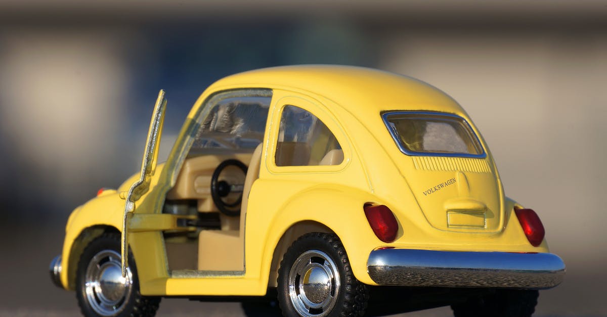 What's more dangerous: sleeping in the car or drowsy driving when on a road-trip? [closed] - Yellow Volkswagen Beetle Die-cast on Floor