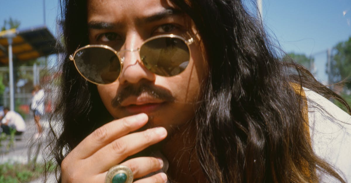 What's Pakistan like for a foreigner (a Polish) guy who wants to travel there? [closed] - Man Wearing Gold Framed Ray-ban Sunglasses