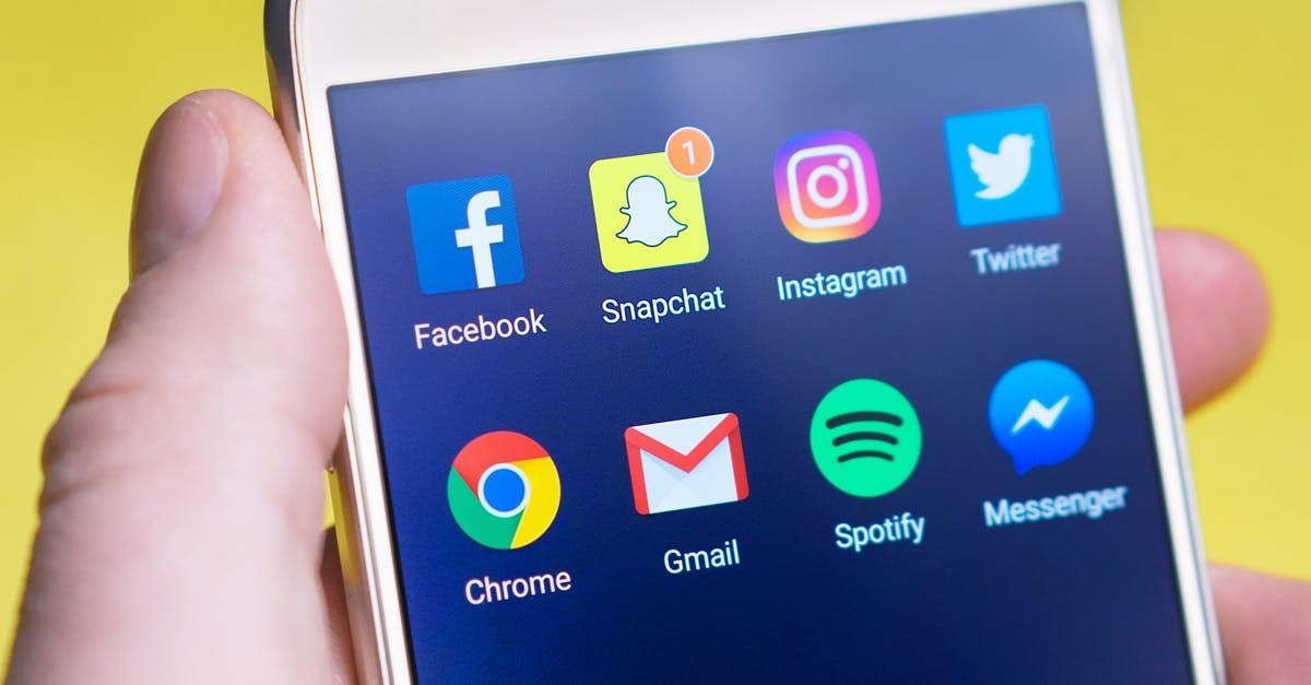 What's the cheapest sim cards with mobile internet available for Tourists in Paris? [closed] - Person Holding Turned-on Android Smartphone