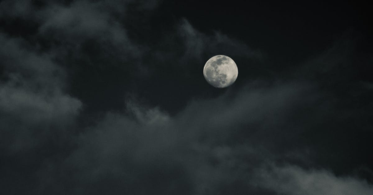 What's the closest SCUBA spot to Chiang Mai? - From below of moon with craters on thick clouds floating in dark sky in evening What's the closest SCUBA spot to Chiang Mai? - From below of moon with craters on thick clouds floating in dark sky in evening