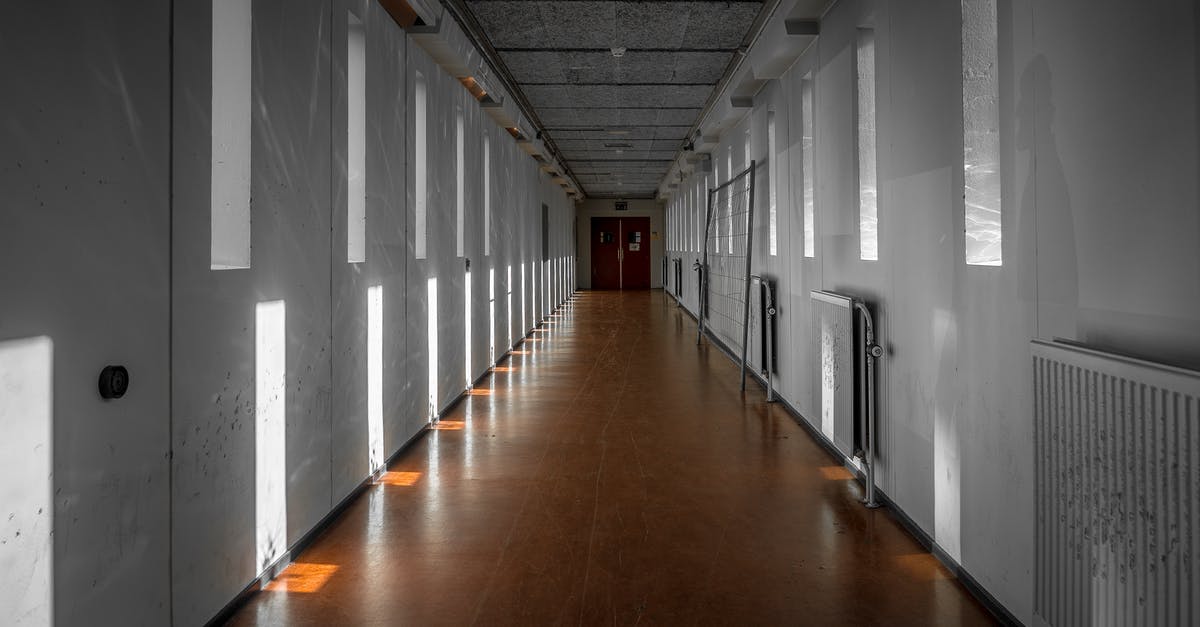 What's the difference between bonus and status miles? - Empty Interior of Passage Between Buildings What's the difference between bonus and status miles? - Empty Interior of Passage Between Buildings