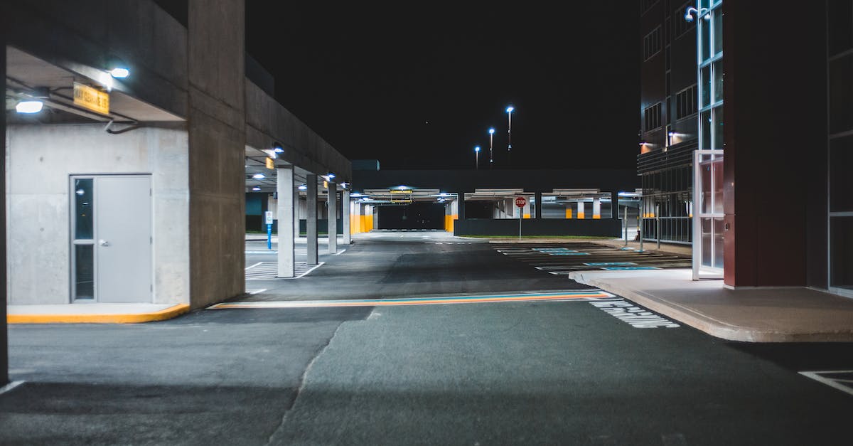 What's the most complicated public transport tariff system in the world? [closed] - Illuminated empty parking lot with concrete walls