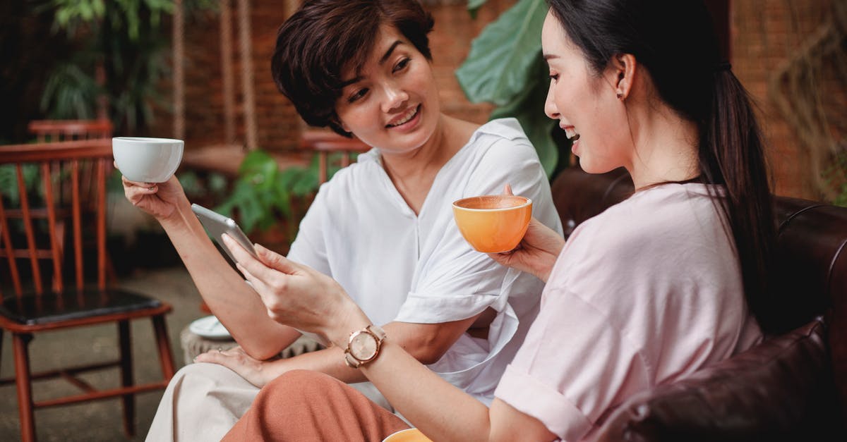 What's the use of trains that spend 6+ hours of daytime en route? [closed] - Positive Asian women drinking coffee in cafe