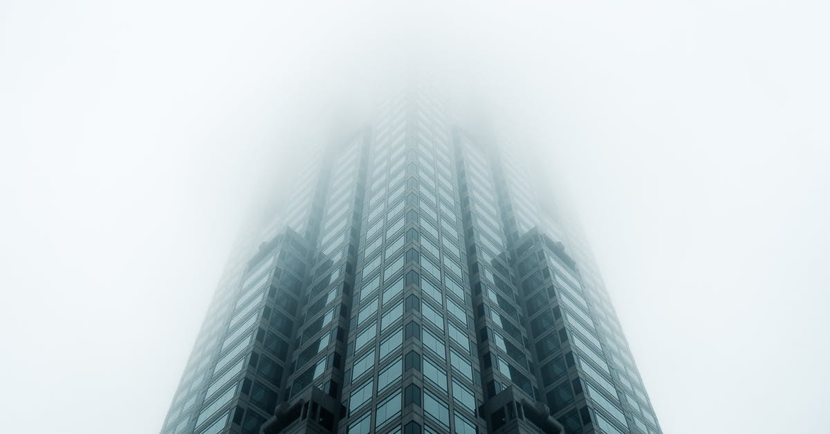 What's up with low visibility in Thailand? - Low Angle Photo of High Rise Building What's up with low visibility in Thailand? - Low Angle Photo of High Rise Building