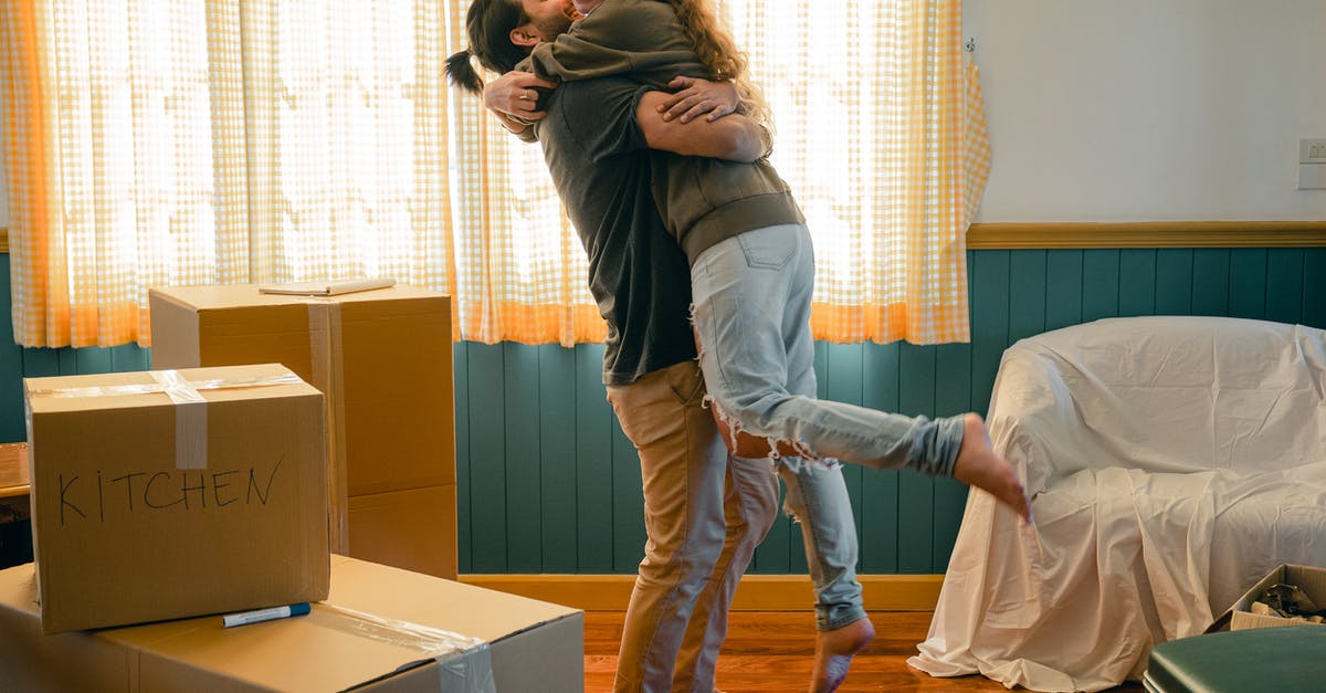 What activities may one carry out on a Standard Visitor visa? - Side view full body barefoot young bearded male in casual clothes standing against window and lifting laughing girlfriend up during relocation and unpacking things from cardboard boxes What activities may one carry out on a Standard Visitor visa? - Side view full body barefoot young bearded male in casual clothes standing against window and lifting laughing girlfriend up during relocation and unpacking things from cardboard boxes