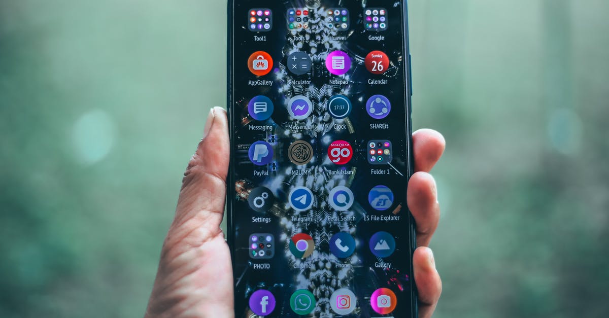 What address do I use for Nexus application? - Crop person holding modern mobile phone What address do I use for Nexus application? - Crop person holding modern mobile phone