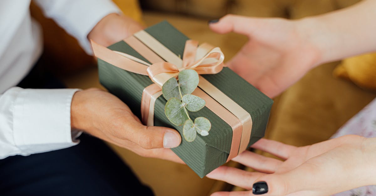 What are my options after receiving a visa refusal at the German embassy? [closed] - Person Giving a Gift Box