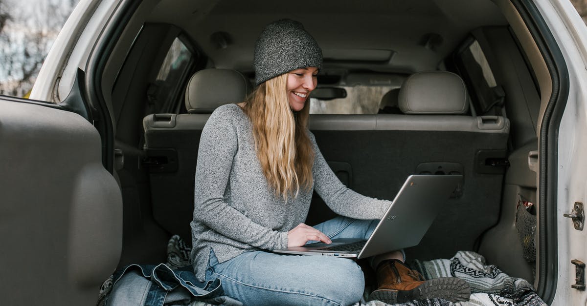 What are my options for nomad working in the EU? - Woman in Gray Sweater and Blue Denim Jeans Sitting on Car Seat What are my options for nomad working in the EU? - Woman in Gray Sweater and Blue Denim Jeans Sitting on Car Seat