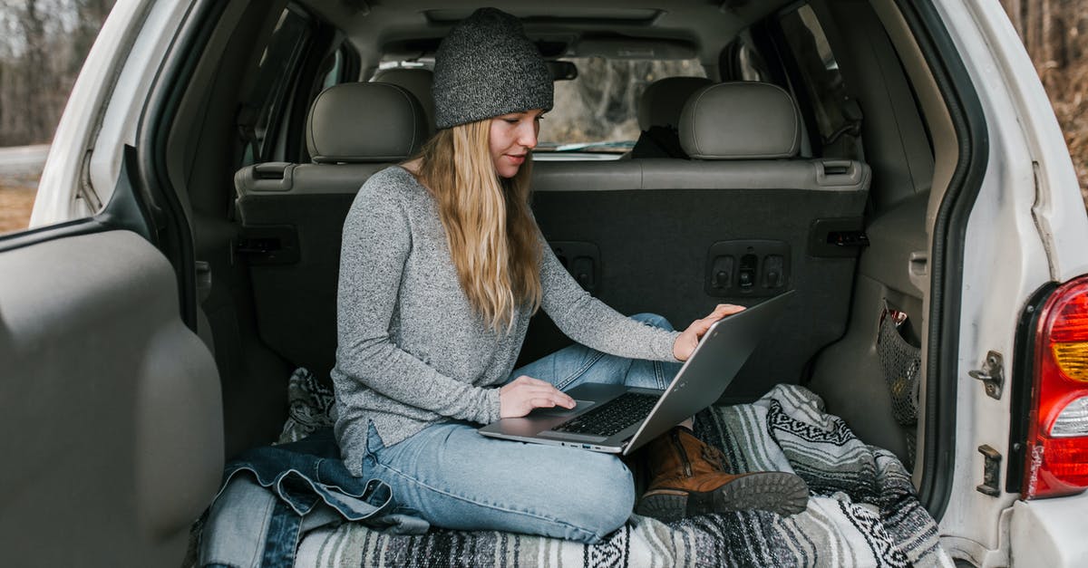 What are my options for nomad working in the EU? - Woman in Gray Sweater and Blue Denim Jeans Sitting on Car Seat What are my options for nomad working in the EU? - Woman in Gray Sweater and Blue Denim Jeans Sitting on Car Seat