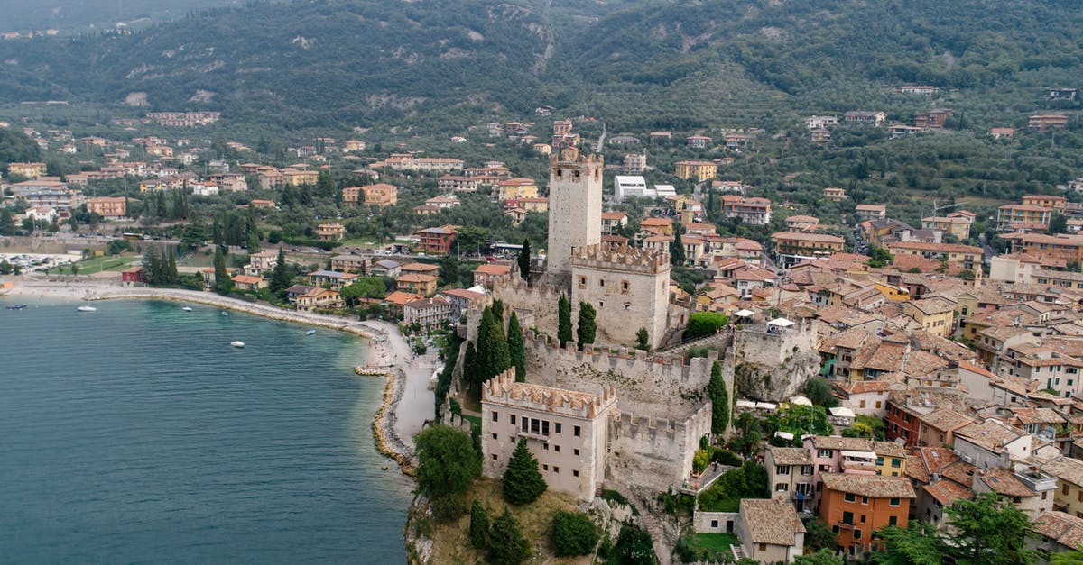 What are my options to go from Milan to Lake Maggiore, Italy? - The Malcesine Castle Overlooking The Lake Garda