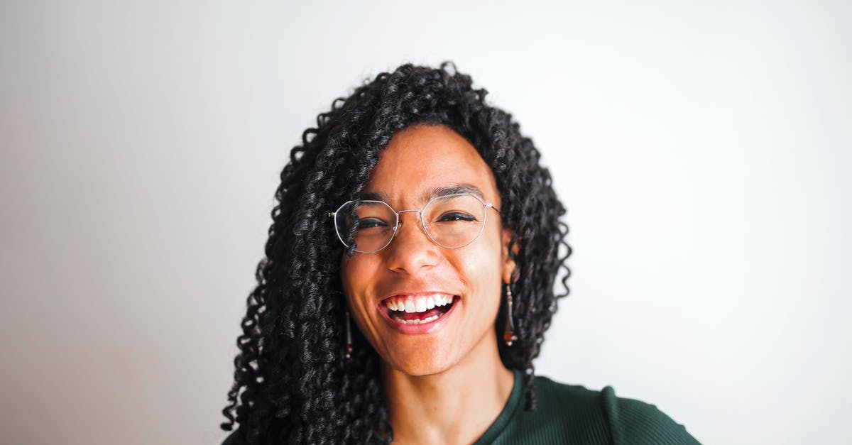 What are some good companies that offer Canadian tours in the Rockies or the Maritimes? [closed] - A Photo Of A Happy Woman