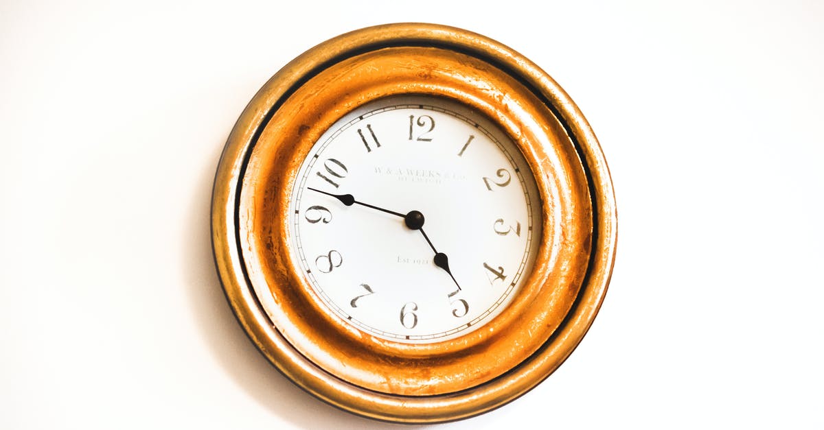 What are some ways to minimize the time spent in customs? - White and Brown Wall Clock Reading at 4:48