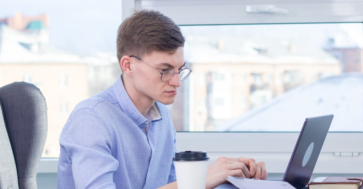 What are the chances of success and the consequences of sneaking into business class? - Woman in Blue Long Sleeve Shirt Using Macbook Pro What are the chances of success and the consequences of sneaking into business class? - Woman in Blue Long Sleeve Shirt Using Macbook Pro