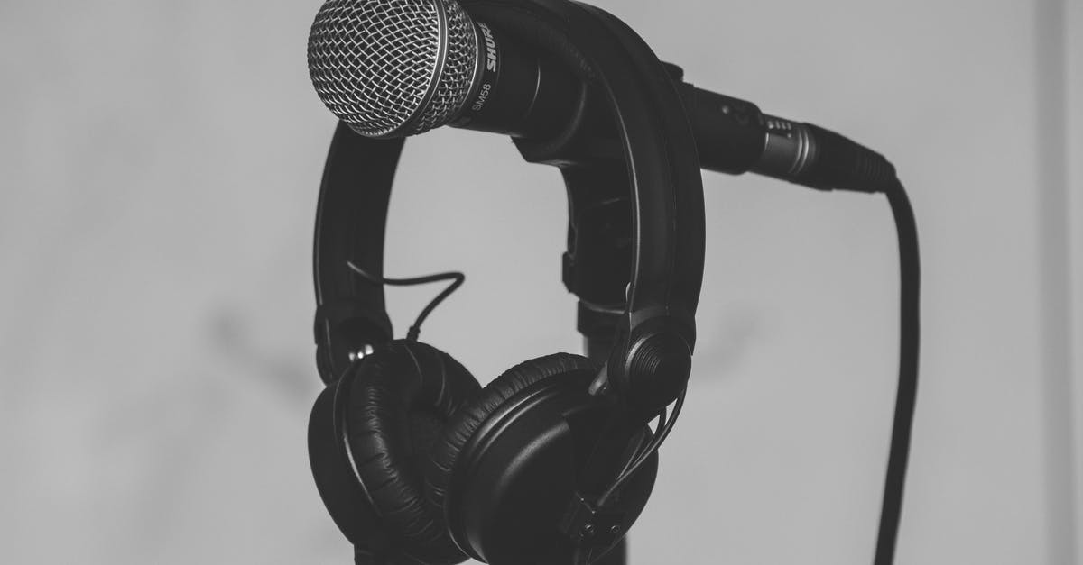What are the headphones like on the British Airways Boeing 787 economy? [closed] - Black Headset Hanging on Black and Gray Microphone
