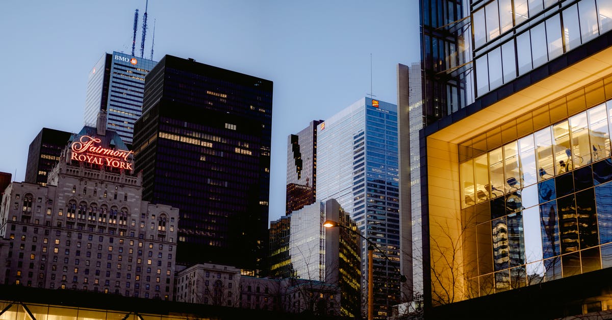 What are the non-hotel options for a 3-month stay in the Greater Toronto Area? - Famous hotel and multistory skyscrapers with glass walls located on street of modern district of Toronto city in evening time What are the non-hotel options for a 3-month stay in the Greater Toronto Area? - Famous hotel and multistory skyscrapers with glass walls located on street of modern district of Toronto city in evening time