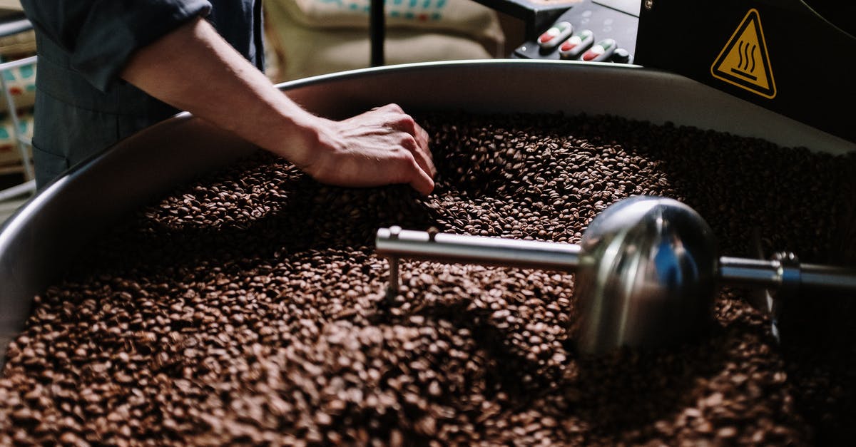 What are the places that sell coffee beans called in Turkey? - Person Holding Silver Ball on Black Round Tray What are the places that sell coffee beans called in Turkey? - Person Holding Silver Ball on Black Round Tray