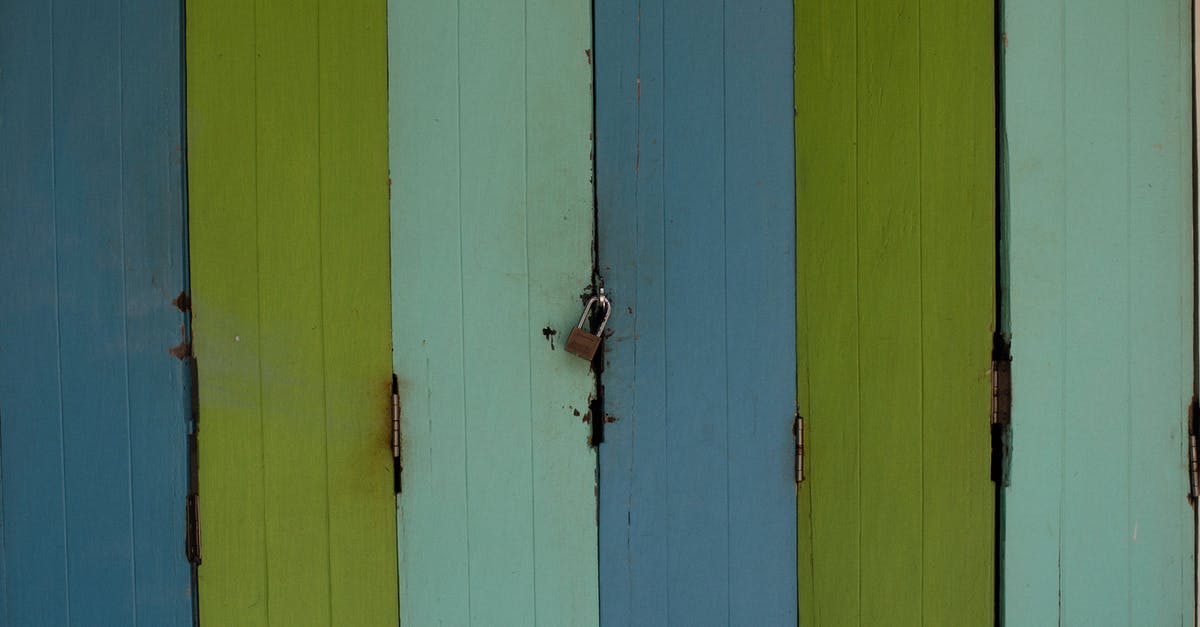 What are the pros & cons of locking zipper pulls to a lock embedded in the suitcase? - Free stock photo of barn, dirty, door