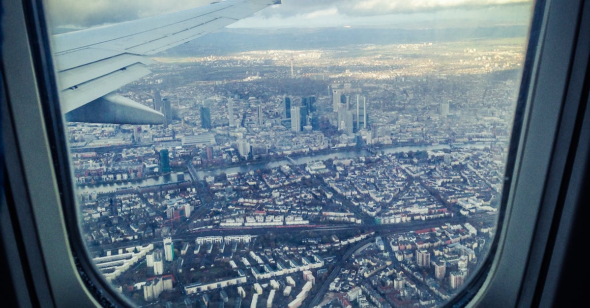 What are the "rules" for multi-city flights? - Airplane Windowpane Showing City Buildings What are the "rules" for multi-city flights? - Airplane Windowpane Showing City Buildings