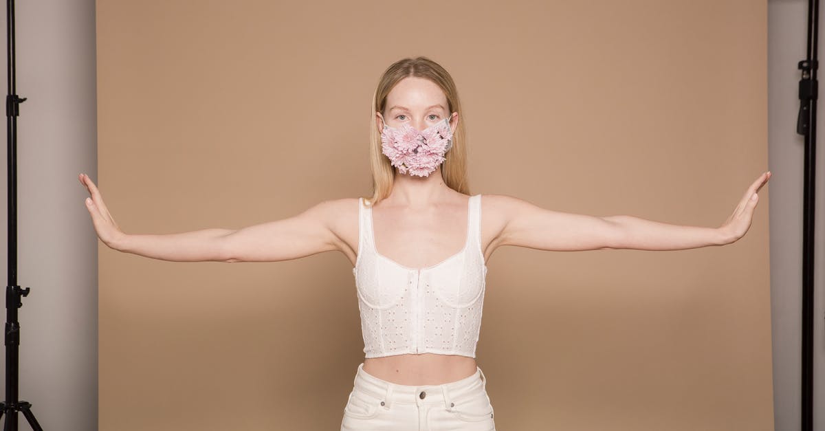 What are the safety benefits of life rafts on planes? - Woman with spread arms in flower mask What are the safety benefits of life rafts on planes? - Woman with spread arms in flower mask