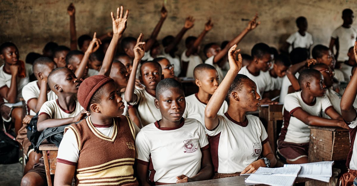 What are the school holiday dates in South Africa - Students with Hands Raised What are the school holiday dates in South Africa - Students with Hands Raised