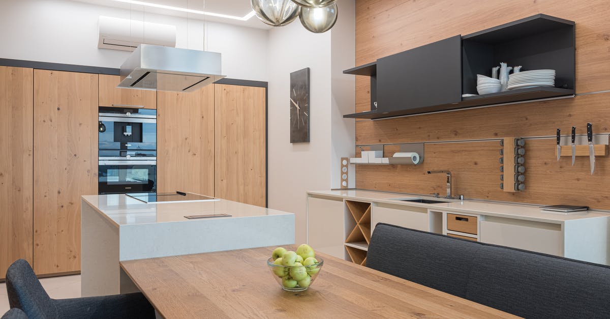 What are these mysterious green balls in the sea in New Caledonia? - Modern kitchen with black cupboard and brown table What are these mysterious green balls in the sea in New Caledonia? - Modern kitchen with black cupboard and brown table
