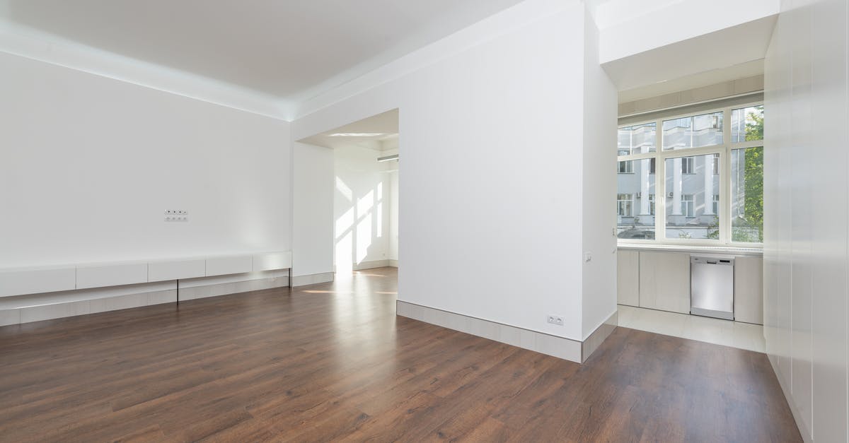 What are these white things in Stuttgart - White Wooden Cabinet on Brown Wooden Parquet Floor What are these white things in Stuttgart - White Wooden Cabinet on Brown Wooden Parquet Floor
