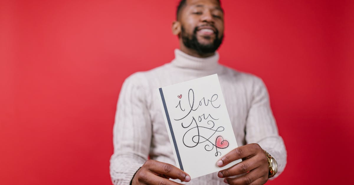 What can I do around Porto Alegre's airport? - Man in White Long Sleeve Shirt Holding Valentine's Day Card What can I do around Porto Alegre's airport? - Man in White Long Sleeve Shirt Holding Valentine's Day Card
