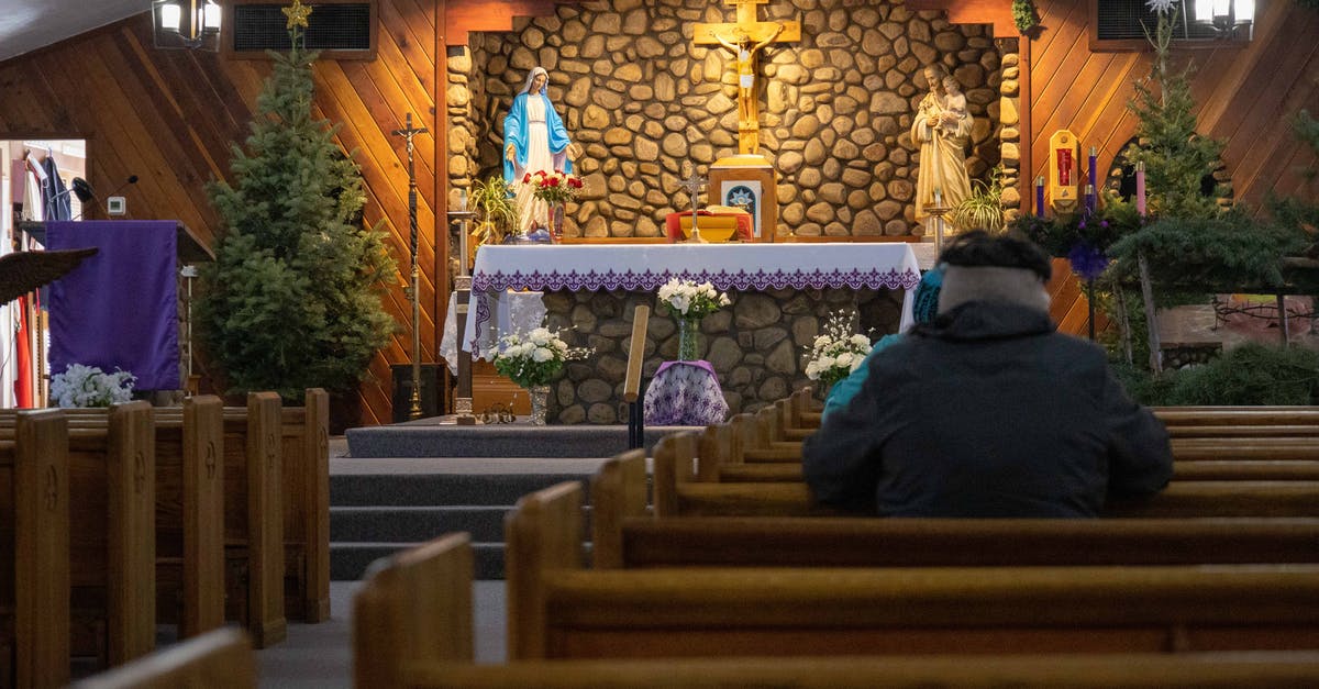 What Catholic churches are these? - People Sitting on Brown Wooden Bench What Catholic churches are these? - People Sitting on Brown Wooden Bench