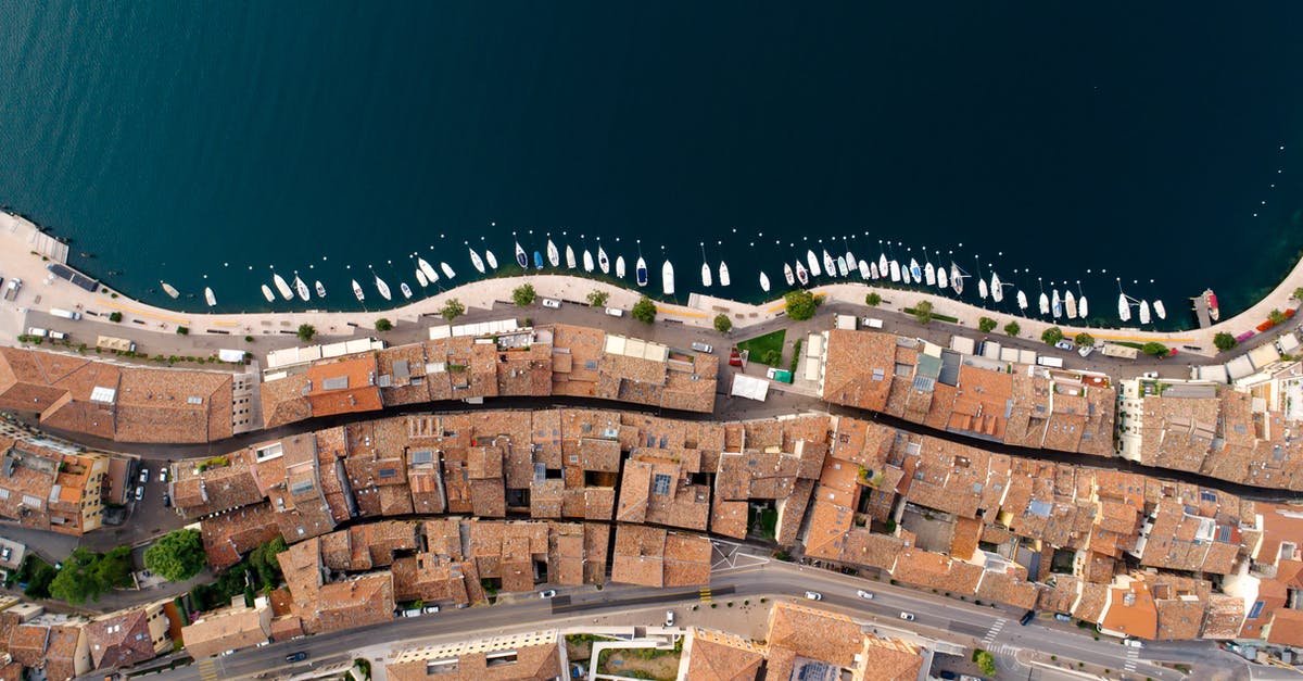 What city is this cityscape? - Brown Brick Building Near Body of Water What city is this cityscape? - Brown Brick Building Near Body of Water