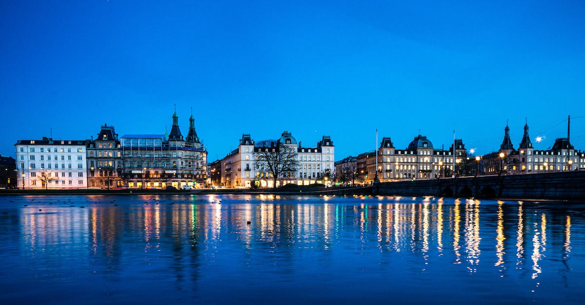 What city is this cityscape? - City Skyline Across Body of Water during Night Time What city is this cityscape? - City Skyline Across Body of Water during Night Time