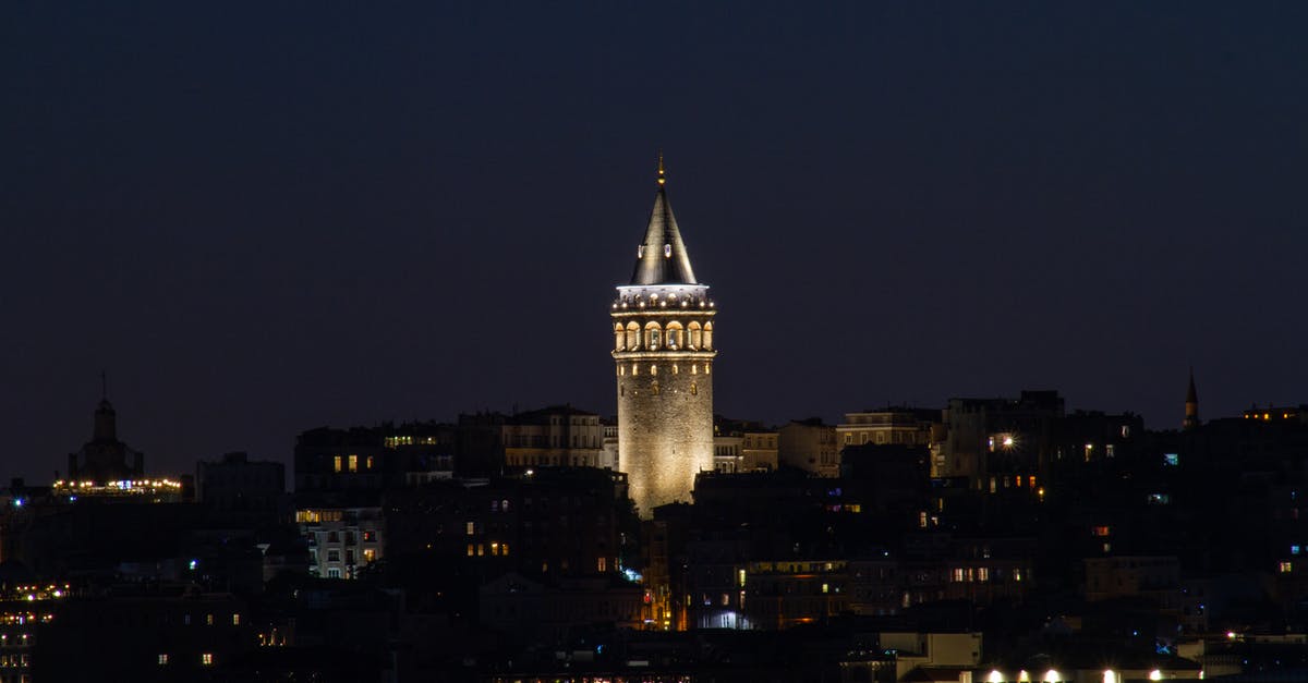 What city skyline is this picture of? - White Concrete Building during Night Time What city skyline is this picture of? - White Concrete Building during Night Time